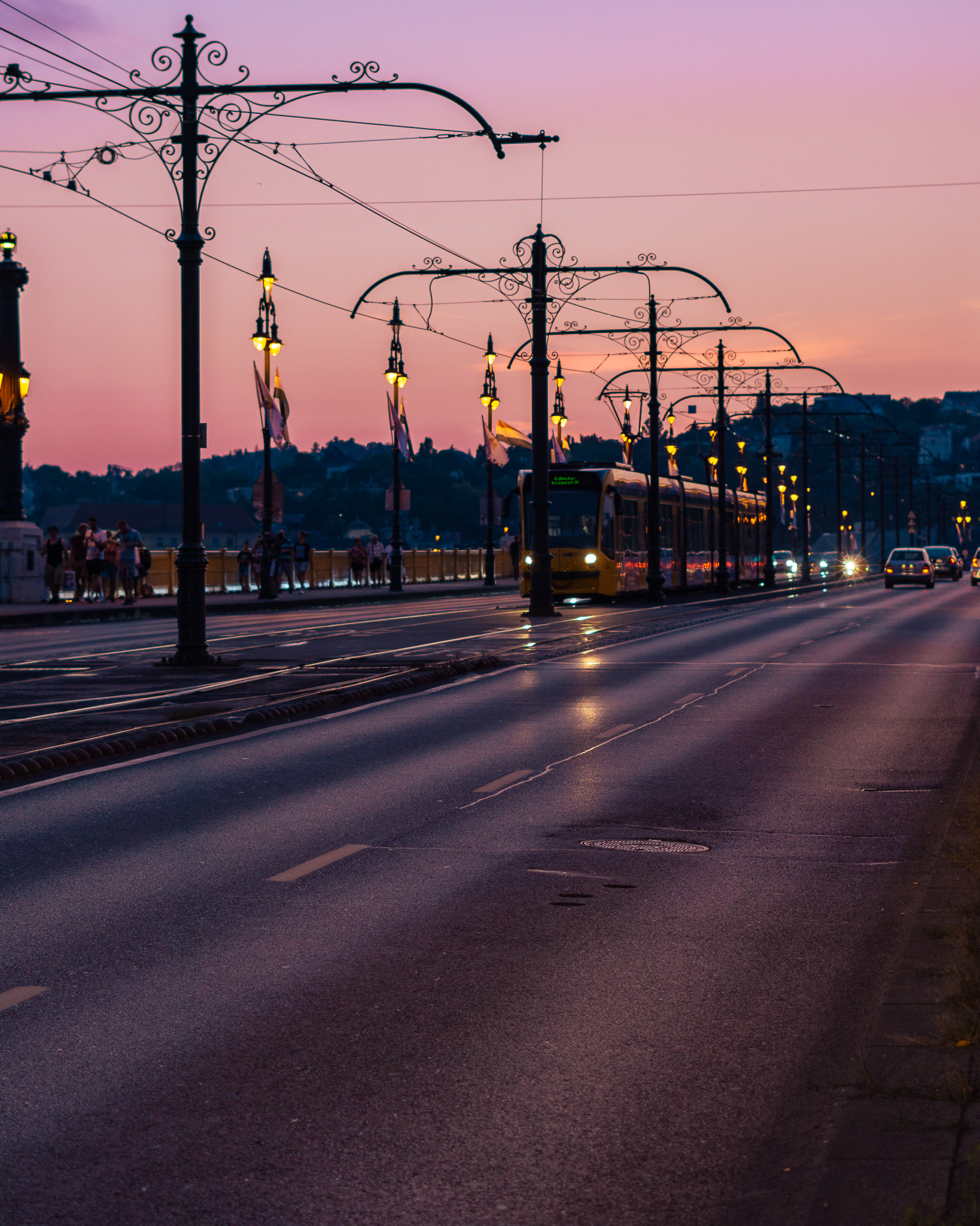 Sunset on Maragaret Bridge with a tram in the distance