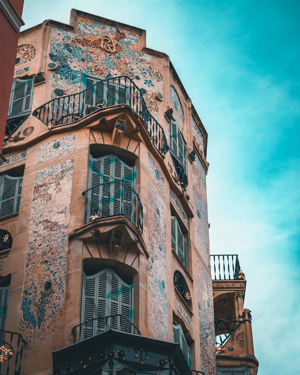 Closeup of an interesting building with mosaic tiles