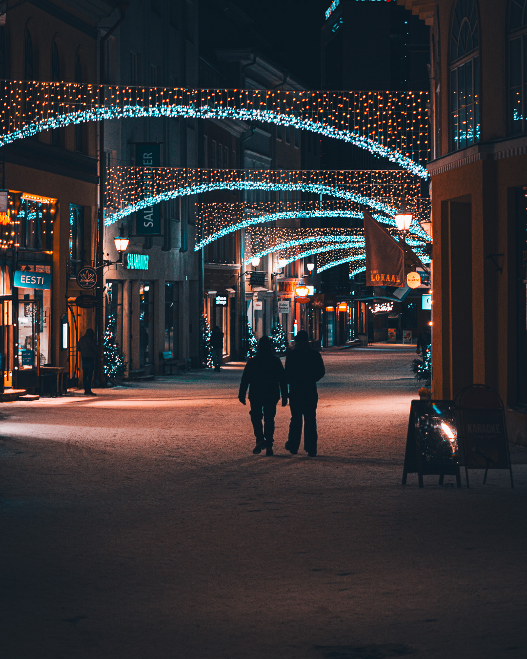 Street in the old town decorated with Christmas lights